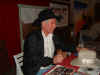 Hat signing.jpg (407130 bytes)